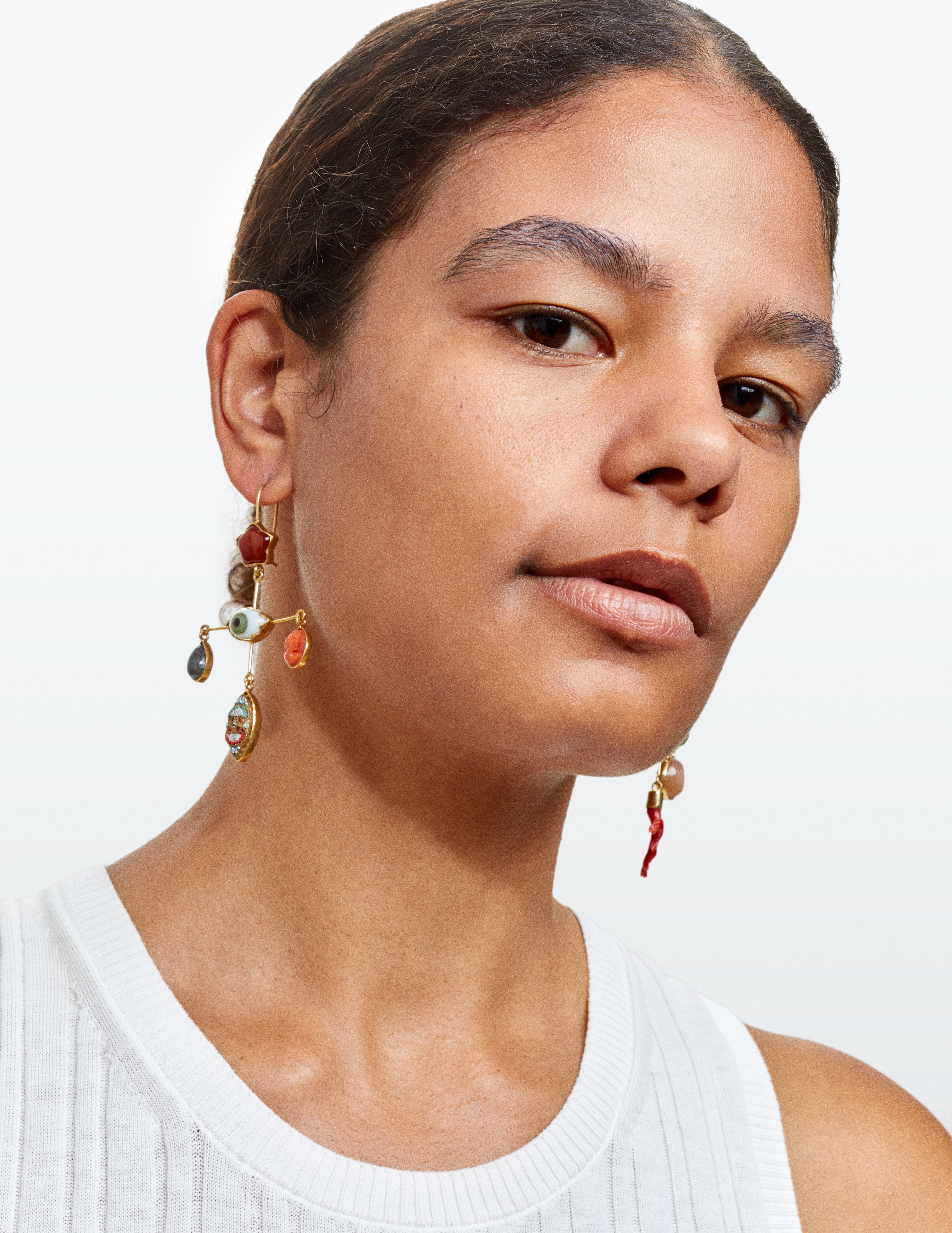 Eye cross drop earrings