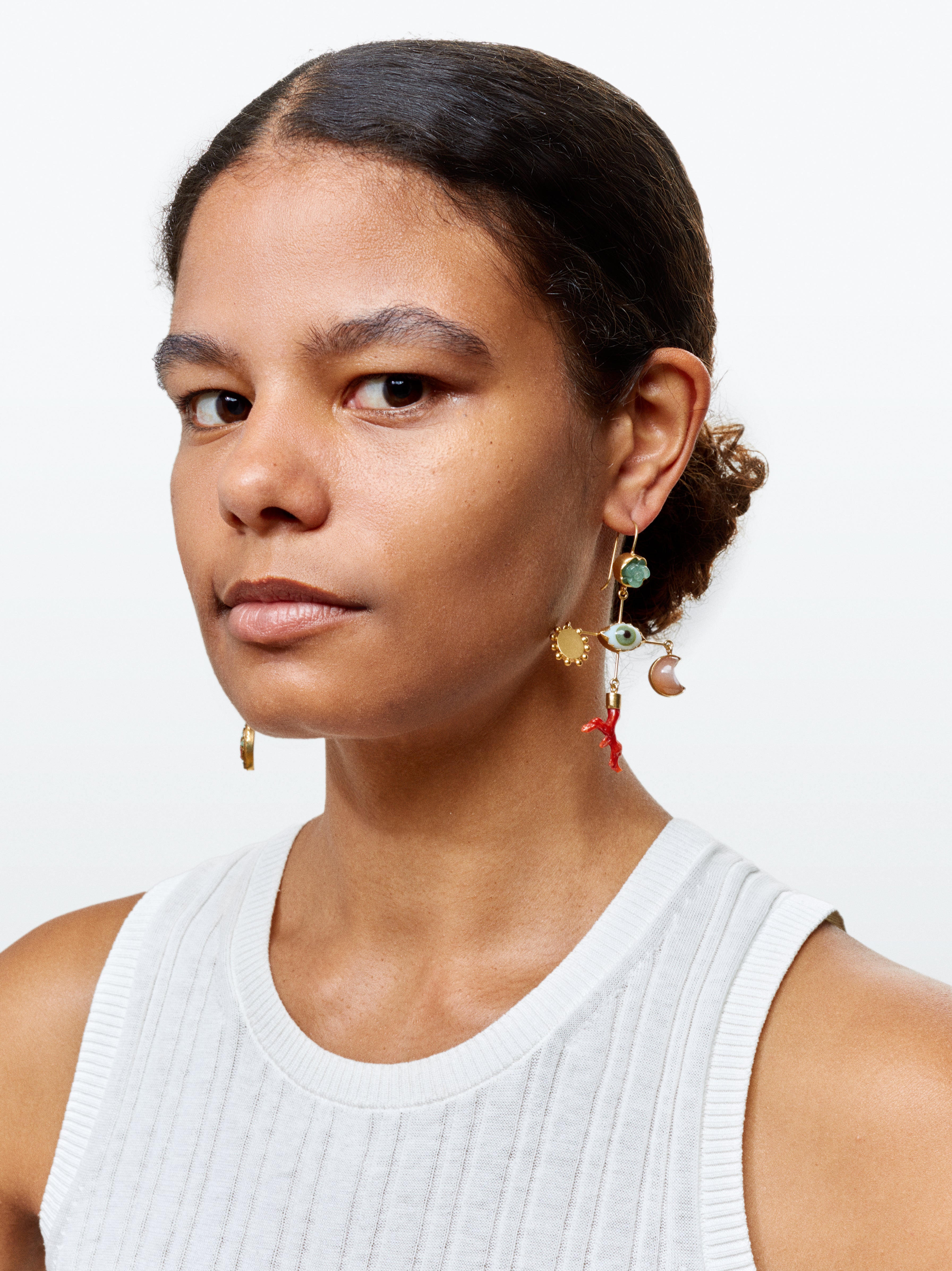 Eye cross drop earrings