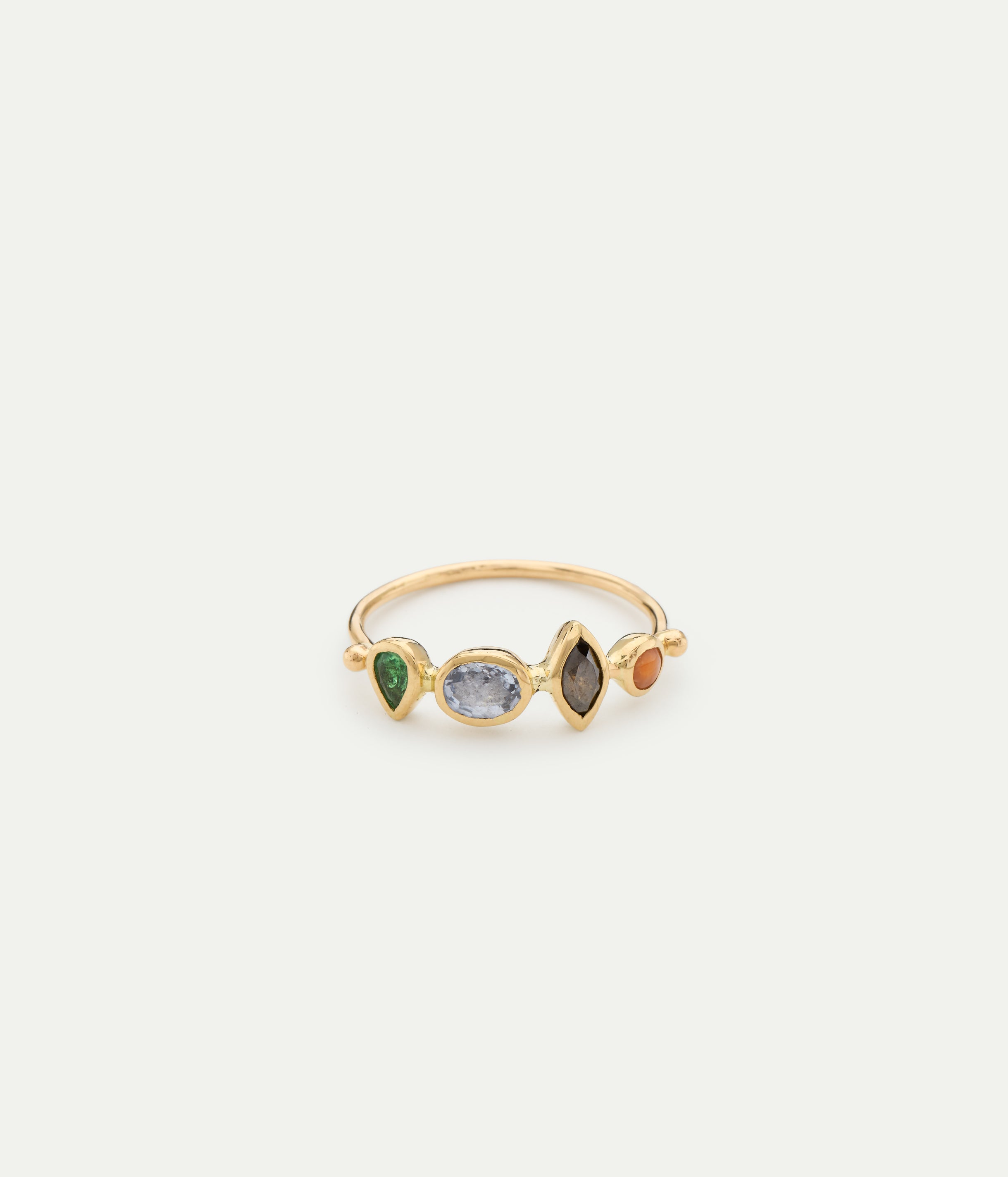 Simple sapphire and tsavorite ring