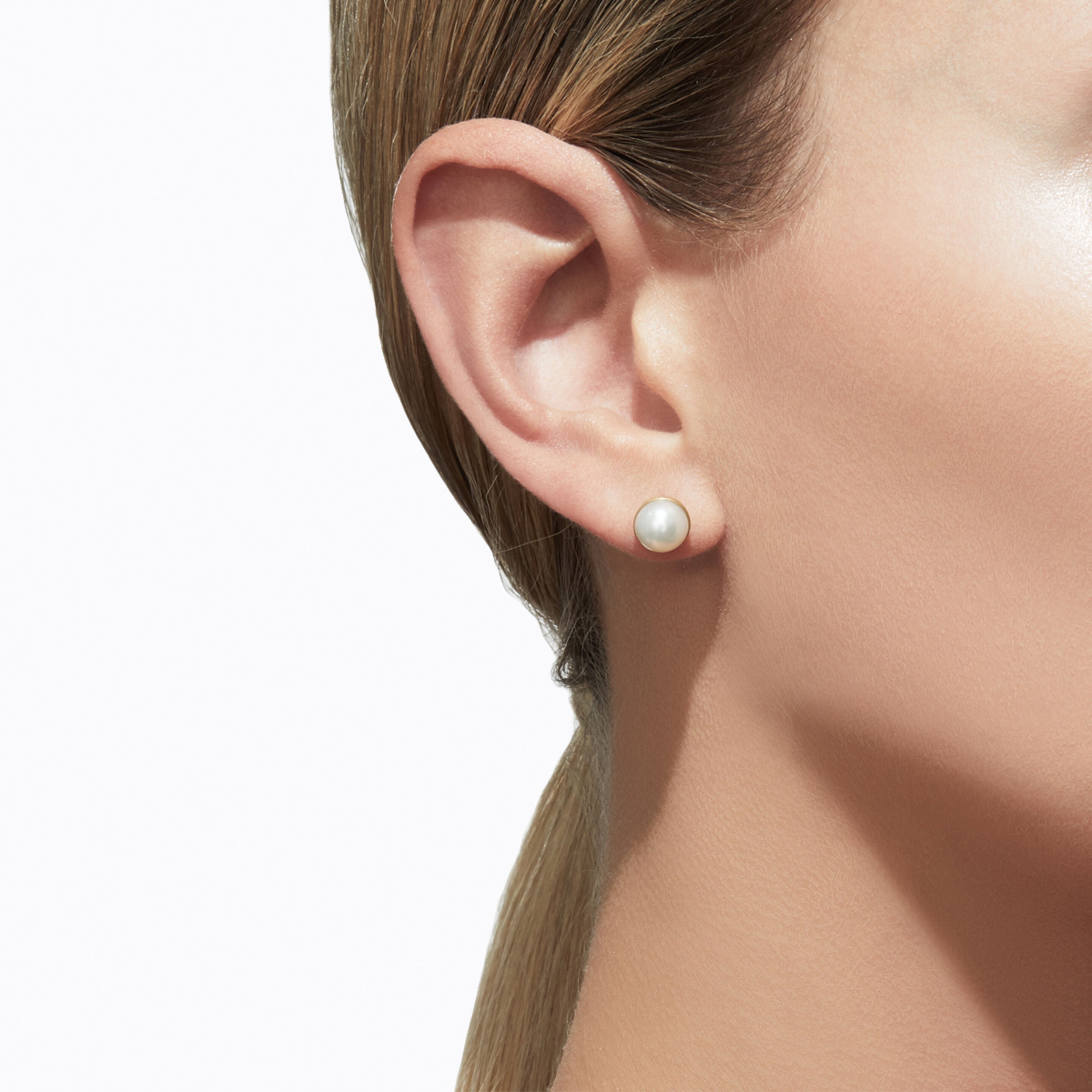 Boucle d'oreille single Half pearl