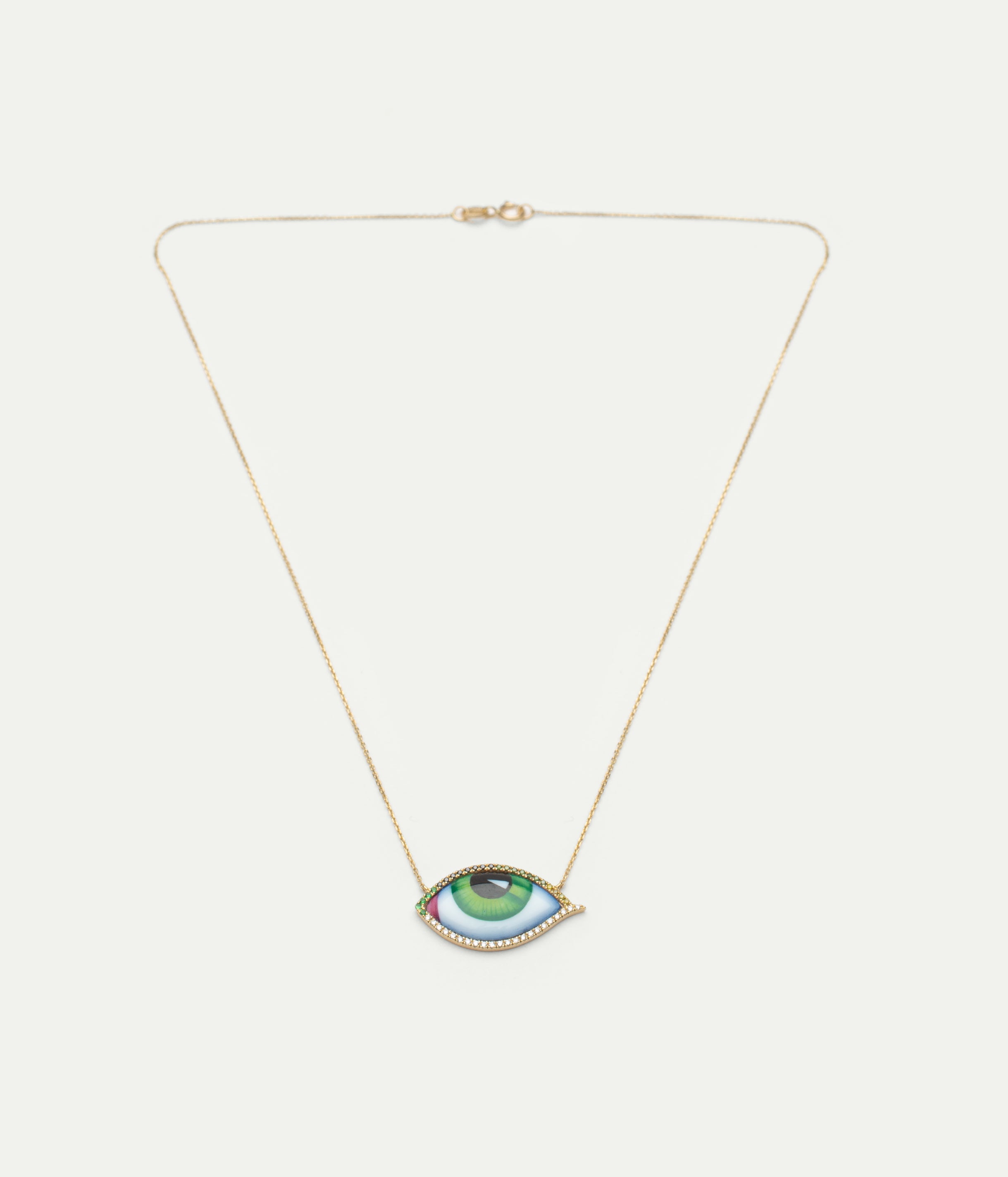 Yellow gold and diamond eye necklace