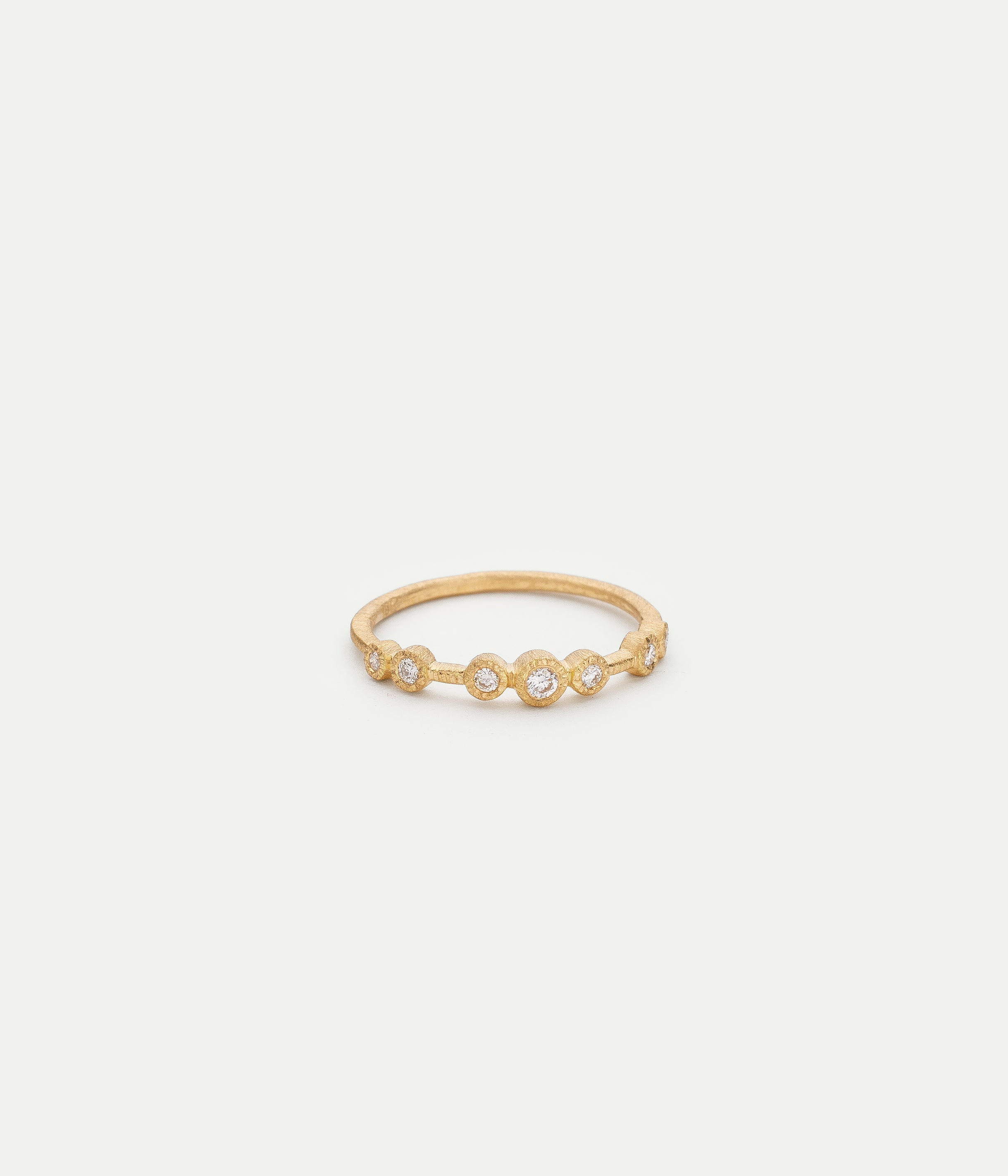 7 bezel yellow gold and diamond ring