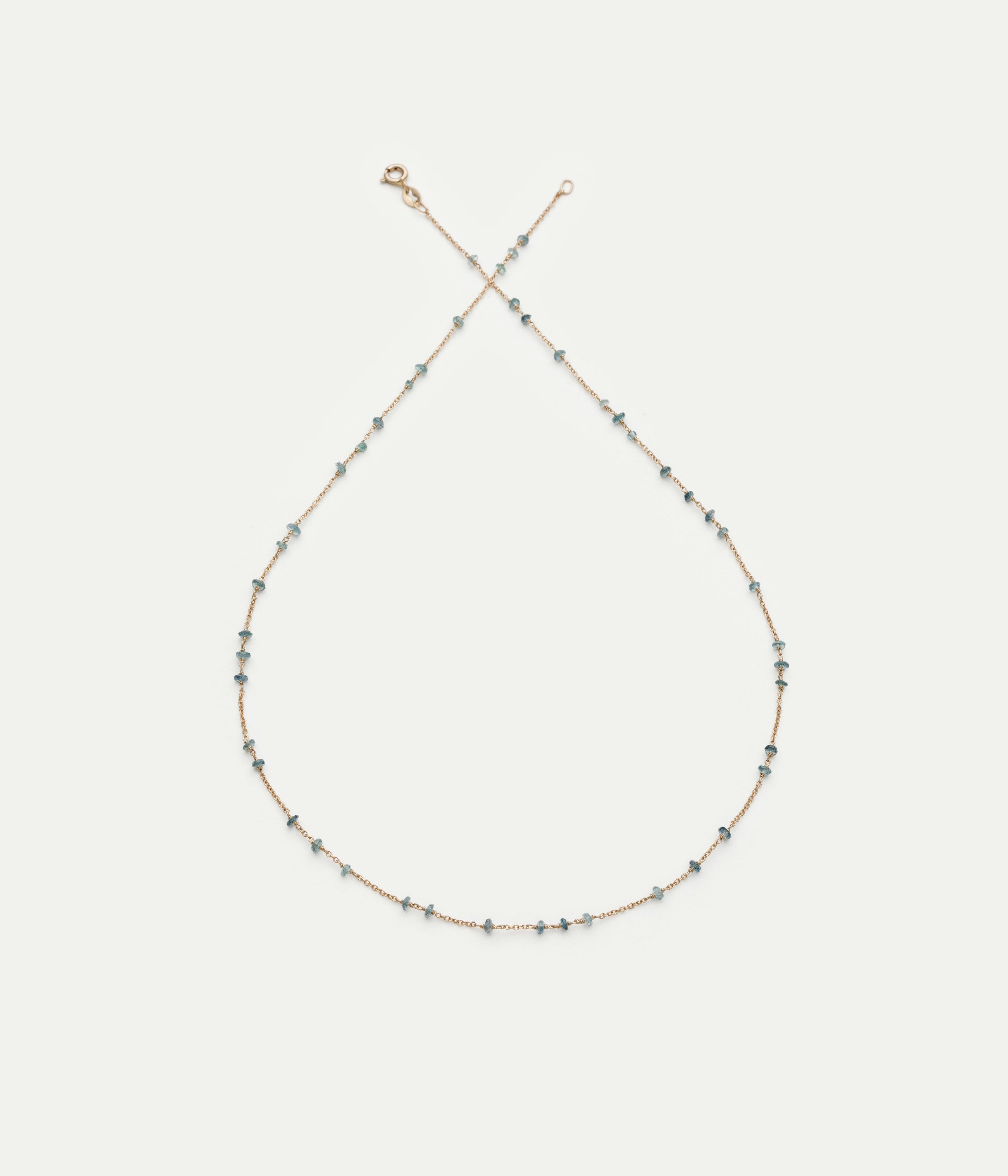 Collier Glitter or gris et saphir bleu