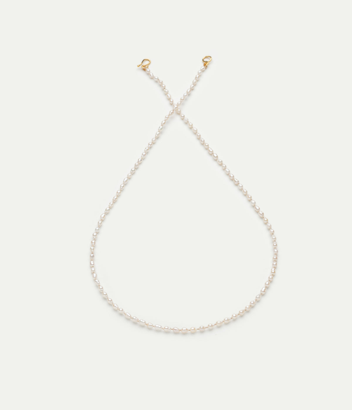 Seed pearl unknotted necklace