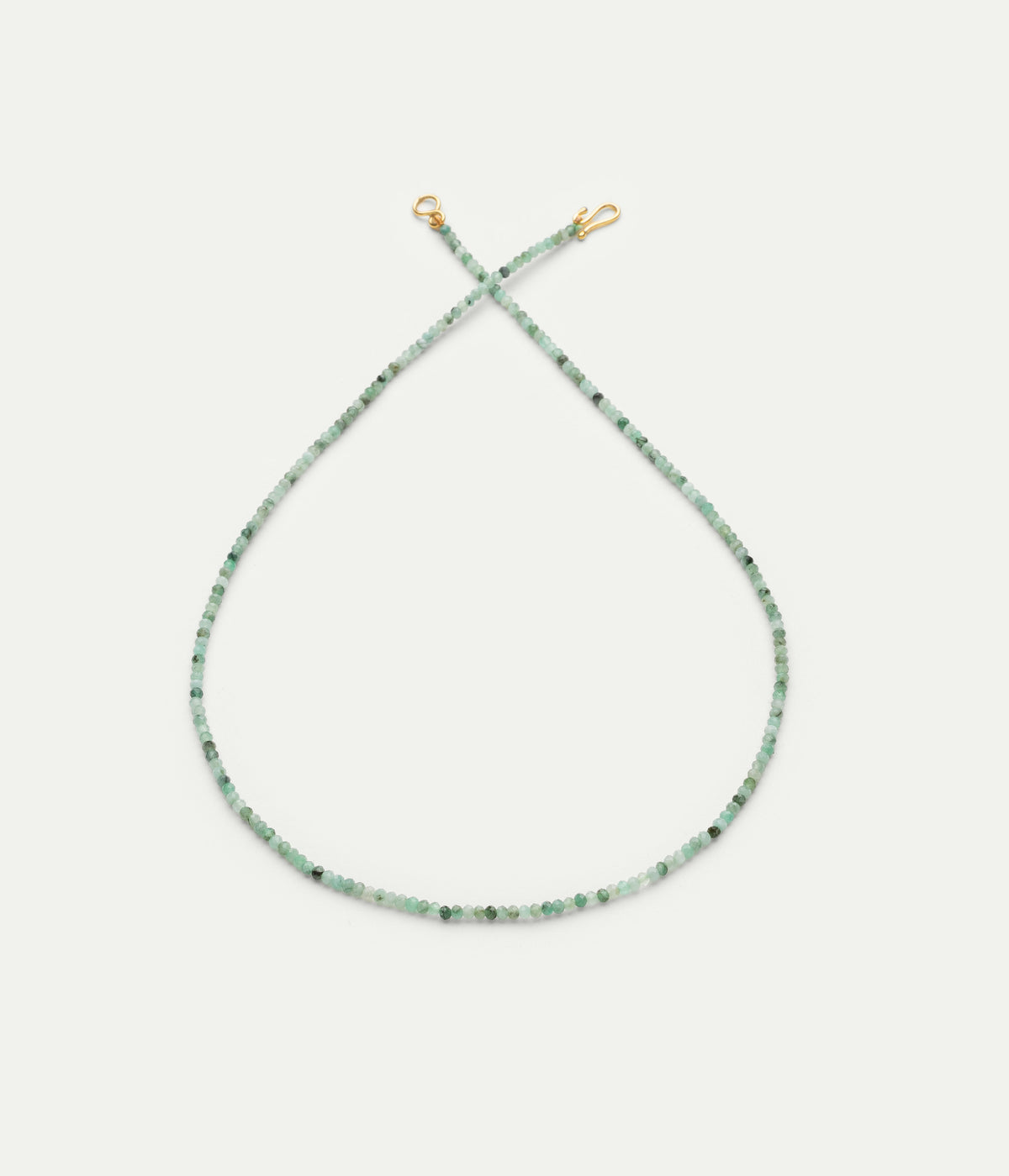 Emerald and yellow gold necklace