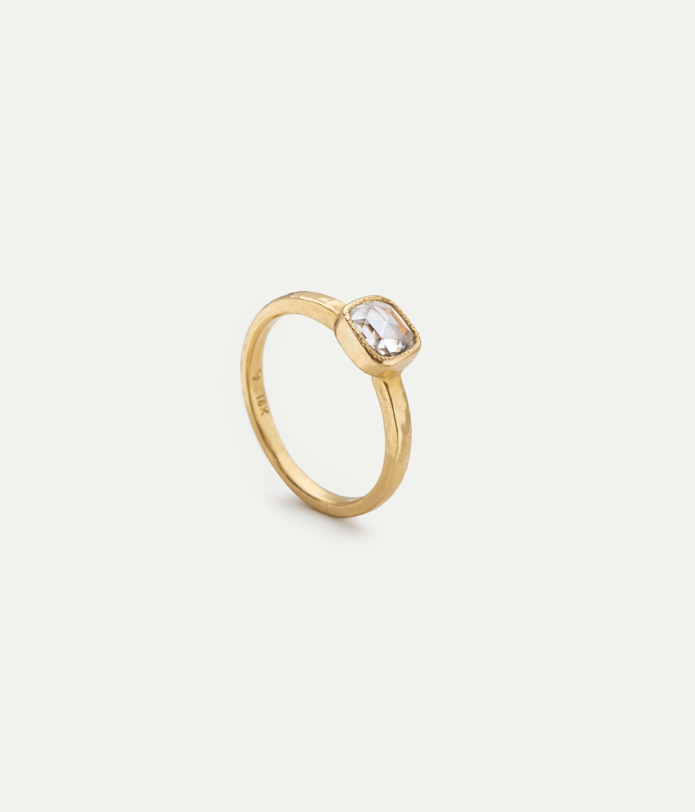 Solitaire yellow gold and diamond ring