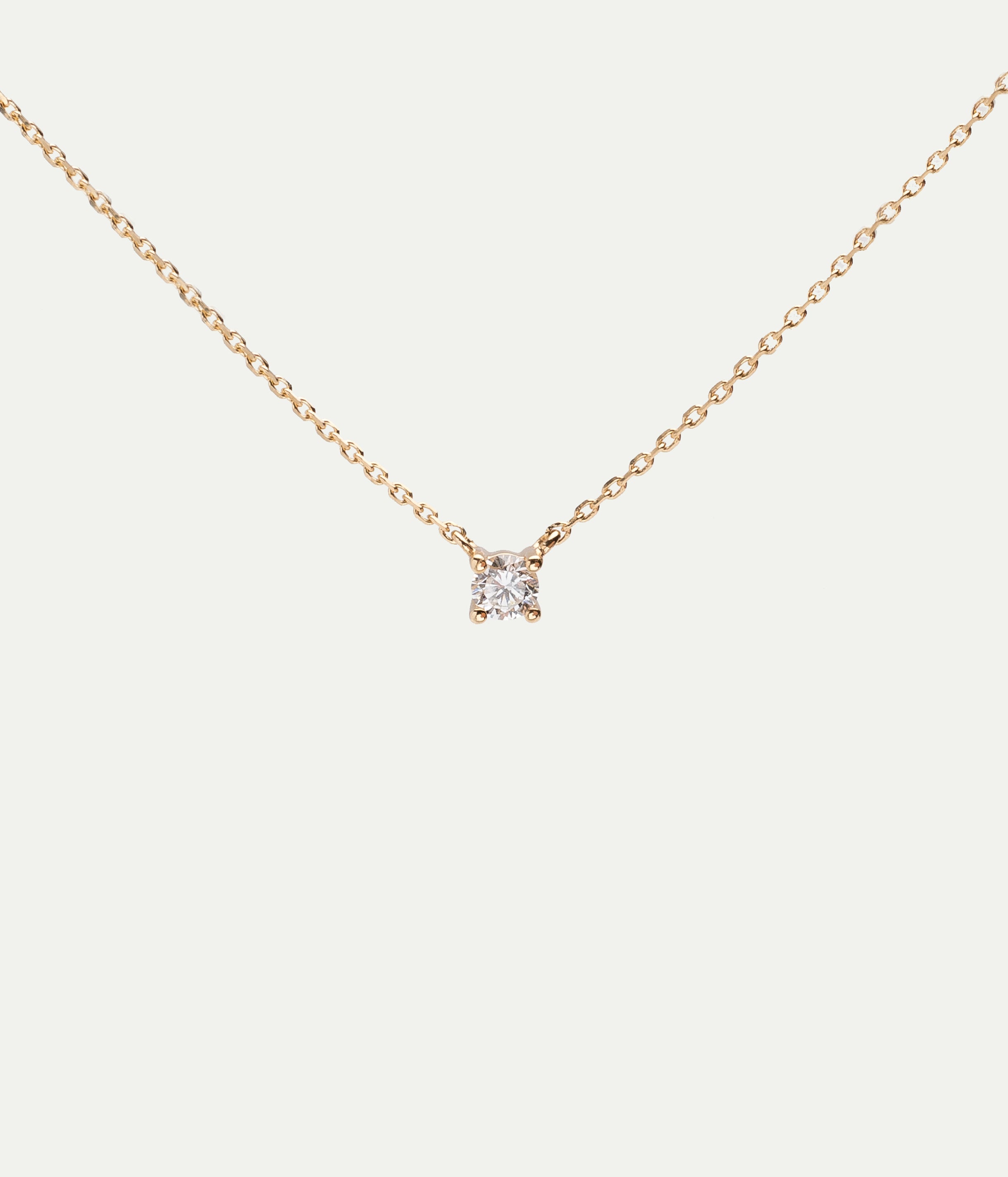 Solitaire yellow gold and diamond necklace